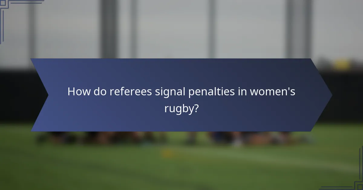 How do referees signal penalties in women's rugby?